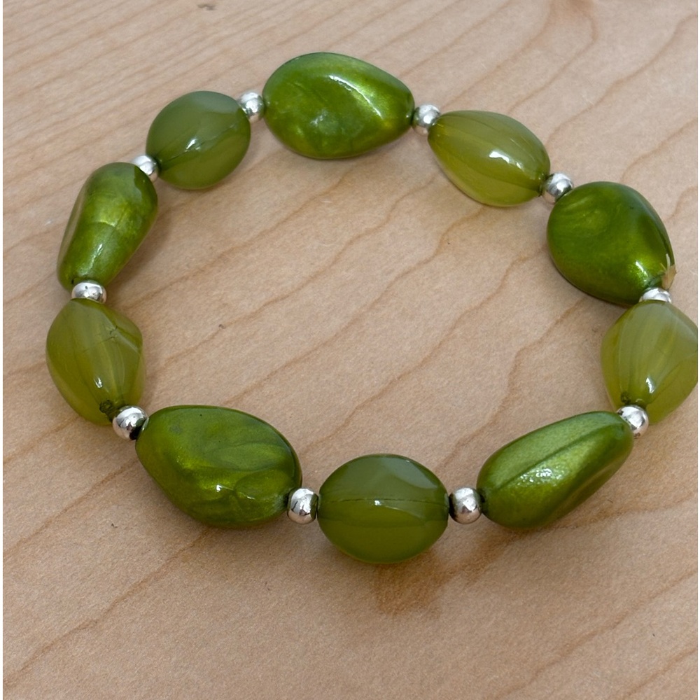 Olive green beaded stretch bracelet/ silver color beads/ fits 6 3/4 in wrist